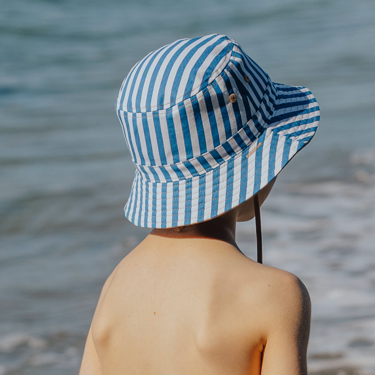 CRYWOLF REVERSIBLE BUCKET HAT | DEEP SEA STRIPE