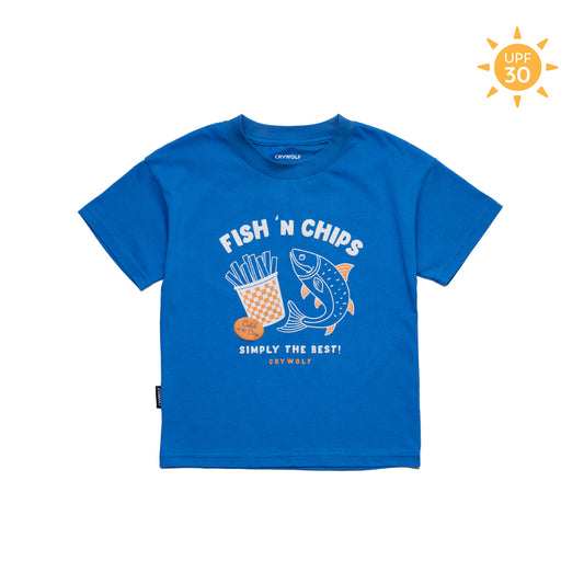 A bright blue short-sleeve kids' t-shirt with a 'Fish 'n Chips' graphic on the front, featuring a fish, french fries, and the text 'SIMPLY THE BEST! DEEP WOLF'. A yellow 'UPF 30' sun icon is in the top right corner.
