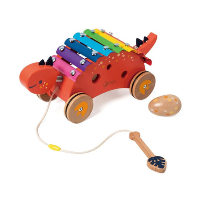 Colorful wooden toy with xylophone and pull string on a white background