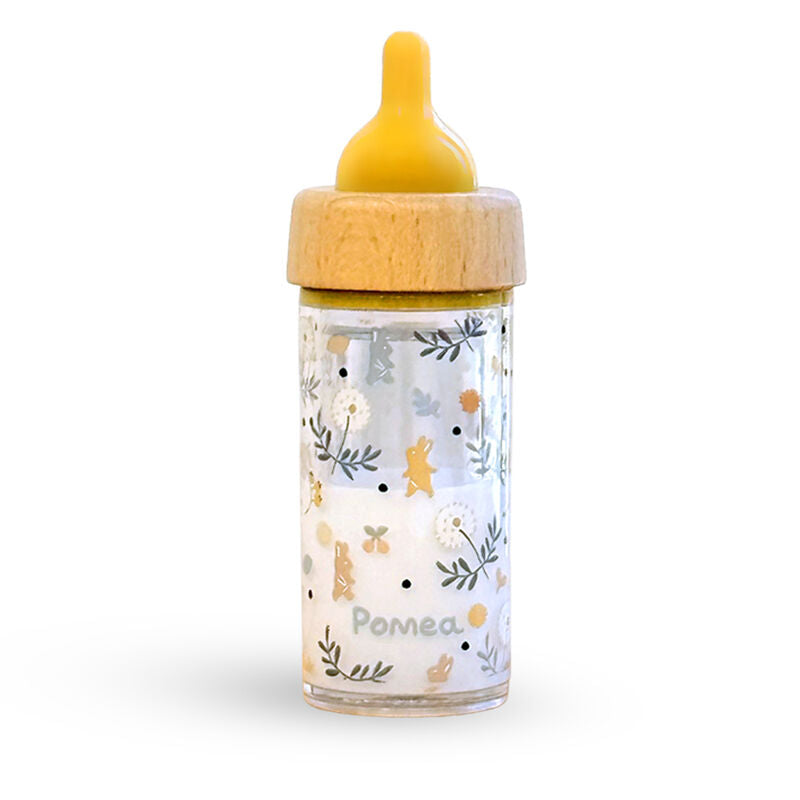 Baby bottle with floral design and wooden cap on a white background