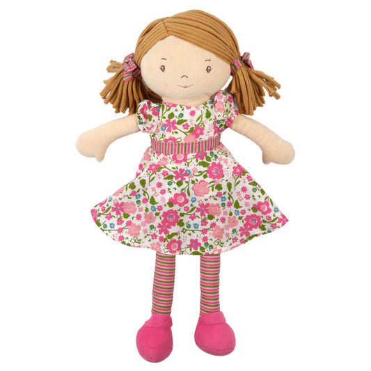 Plush doll with a floral dress and pink shoes on a white background