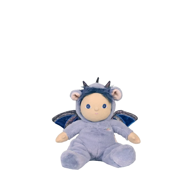 A small plush doll with a pale blue body, cream face and hands, dark blue hair, and small wings, seated against a plain white background.