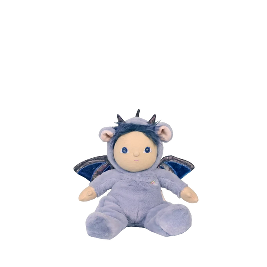 A small plush doll with a pale blue body, cream face and hands, dark blue hair, and small wings, seated against a plain white background.