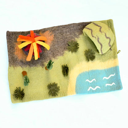 Felted pouch with landscape design on a white background
