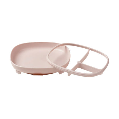 Pink plastic tray with handle on a white background