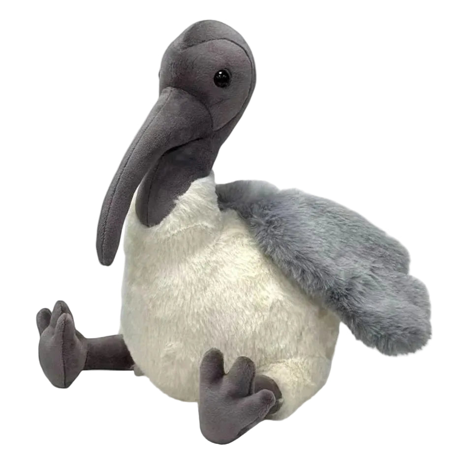 Plush toy pelican on a white background