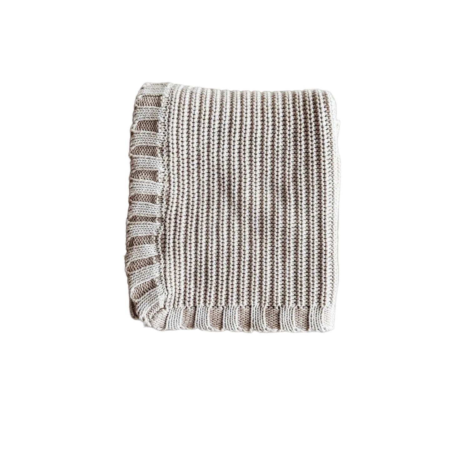 Textured blanket with fringe on a light gray background