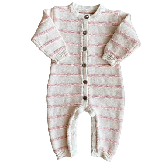 Striped baby onesie with buttons on a plain background