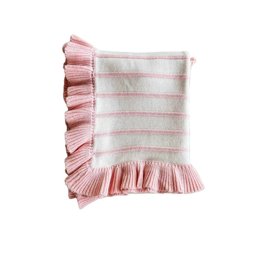 Pink and white striped towel with ruffled edge on a light gray background