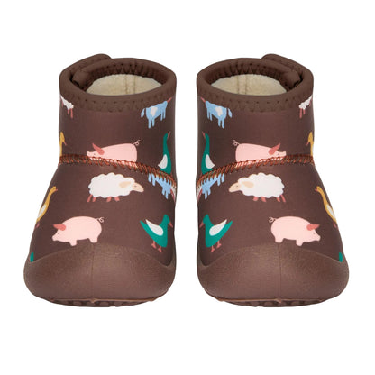 Pair of brown children's shoes with farm animal pattern on a white background