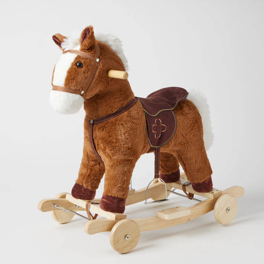 Plush rocking horse with wooden base on a white background