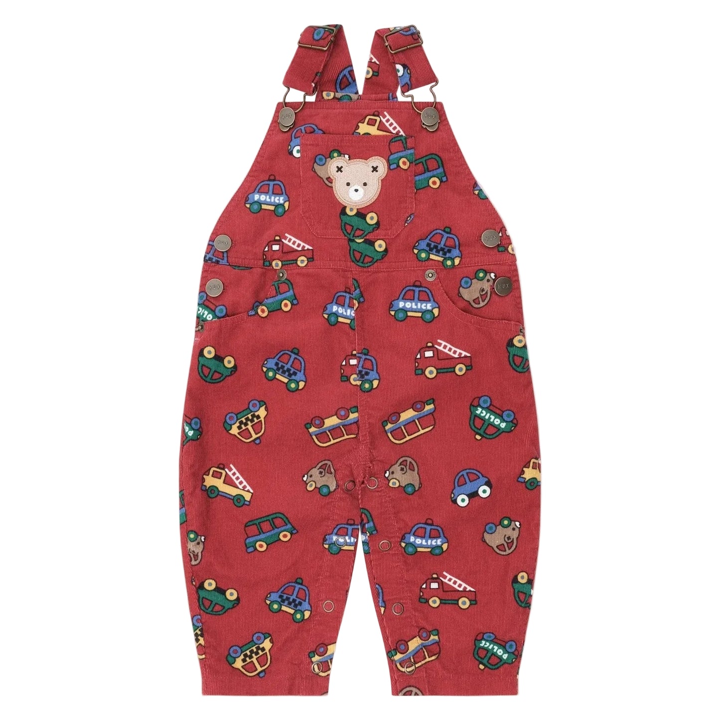 Red children's overalls with vehicle pattern on a beige background