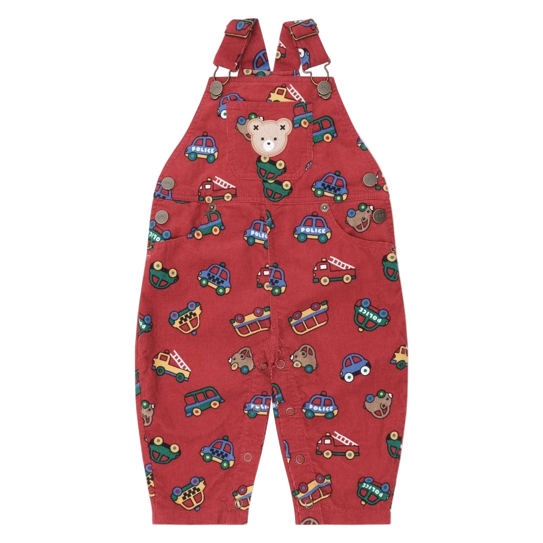 Red children's overalls with vehicle pattern on a beige background