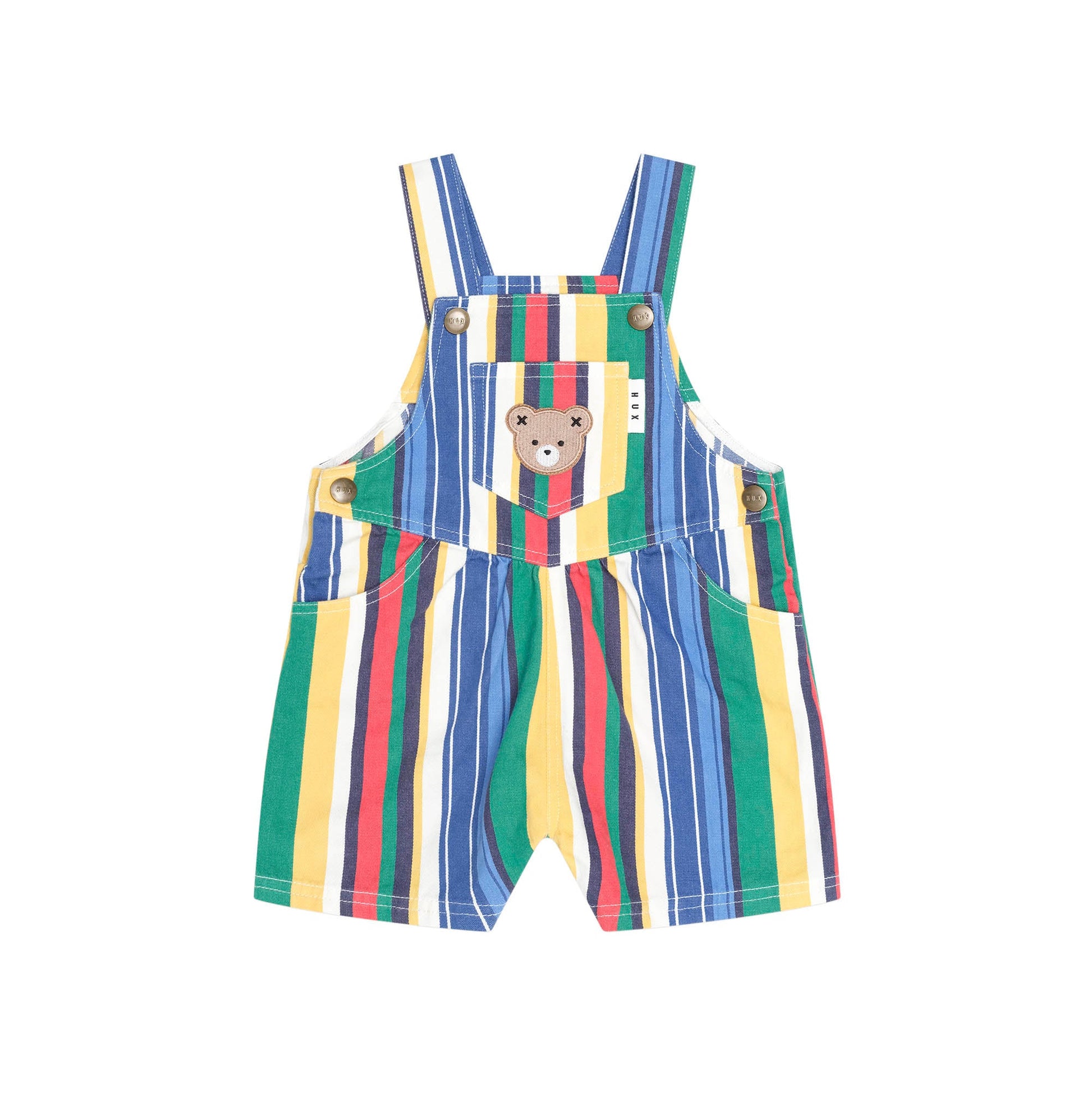 A baby's short overall romper with colorful vertical stripes in green, blue, yellow, red, and white. It features a central pocket with a cartoon bear face patch and adjustable shoulder straps.