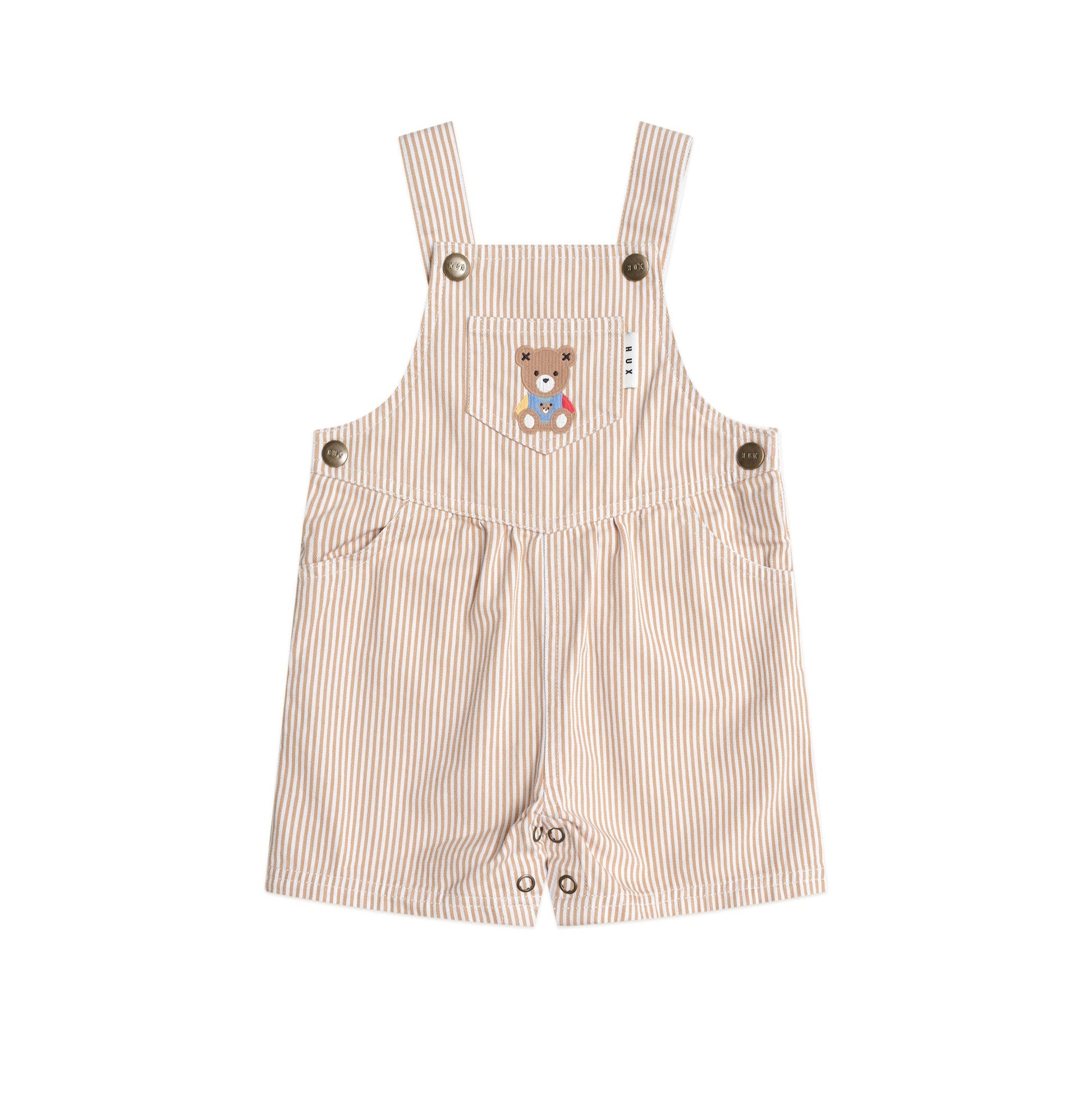 Beige striped overalls with a teddy bear design on a white background