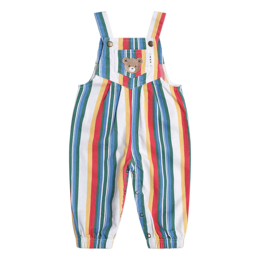 Multicolored striped overalls with a teddy bear design on a white background