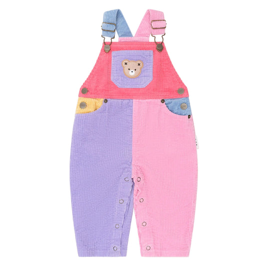 Colorful children's overalls with a bear design on a white background
