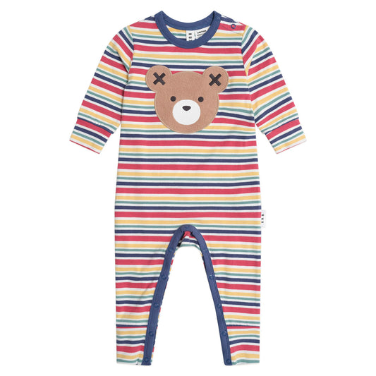 Multicolored striped baby onesie with a teddy bear face on a white background