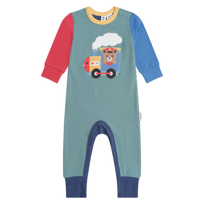 Children's onesie with a train design on a white background