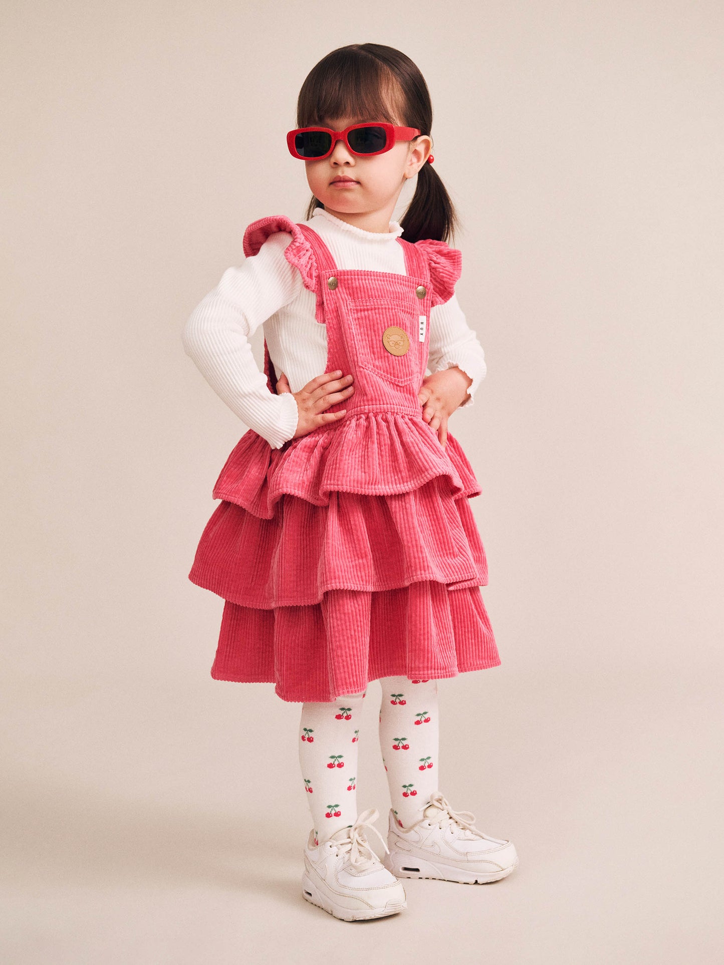 HUXBABY CLASSIC TIERED CORD PINAFORE | CHERRY