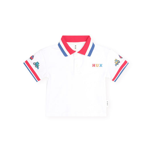 A white short-sleeve polo shirt for kids, featuring a red and blue striped collar, matching striped sleeve cuffs, a colorful 'HUX' logo on the left chest, and cartoon graphics on the sleeves, presented on a solid white background.