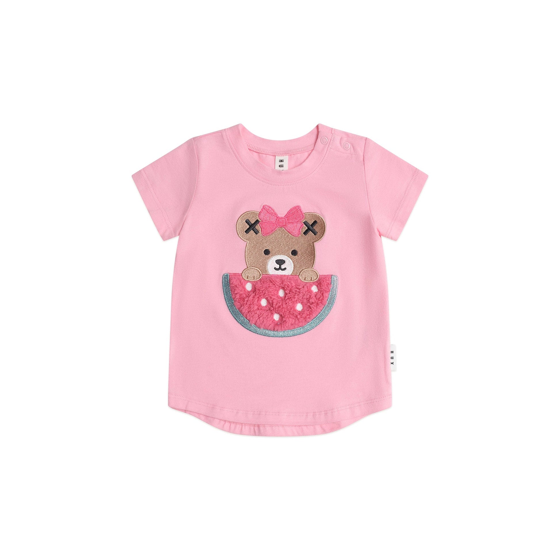 Pink children's t-shirt with a bear design on a white background