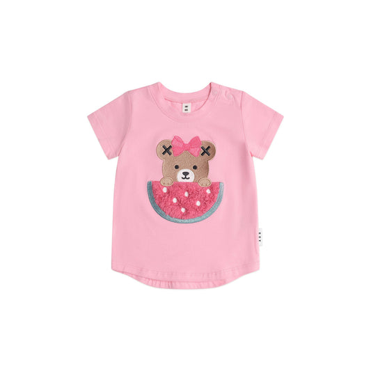 Pink children's t-shirt with a bear design on a white background