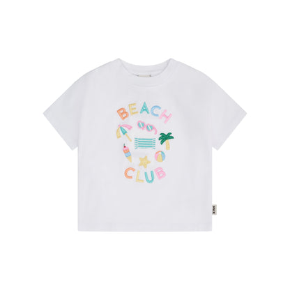 A white short-sleeve crewneck t-shirt featuring a colorful 'BEACH CLUB' graphic on the front with beach-themed illustrations, shown against a plain white background.