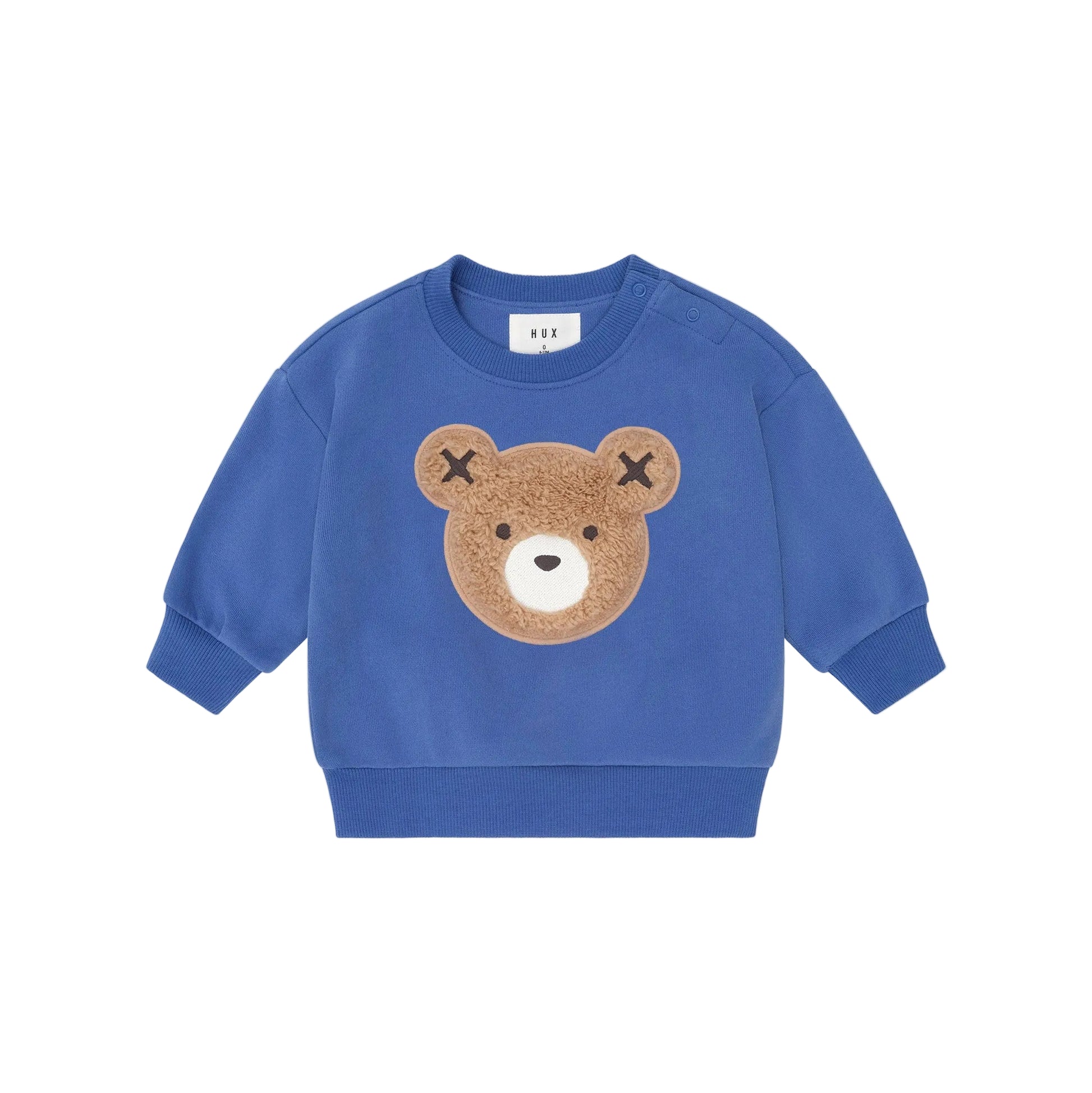 Blue children's sweatshirt with a bear face design on a beige background