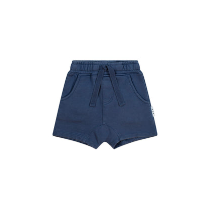 Navy blue shorts with a drawstring on a white background