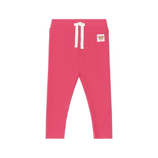 Pink ribbed sweatpants with a logo on a white background