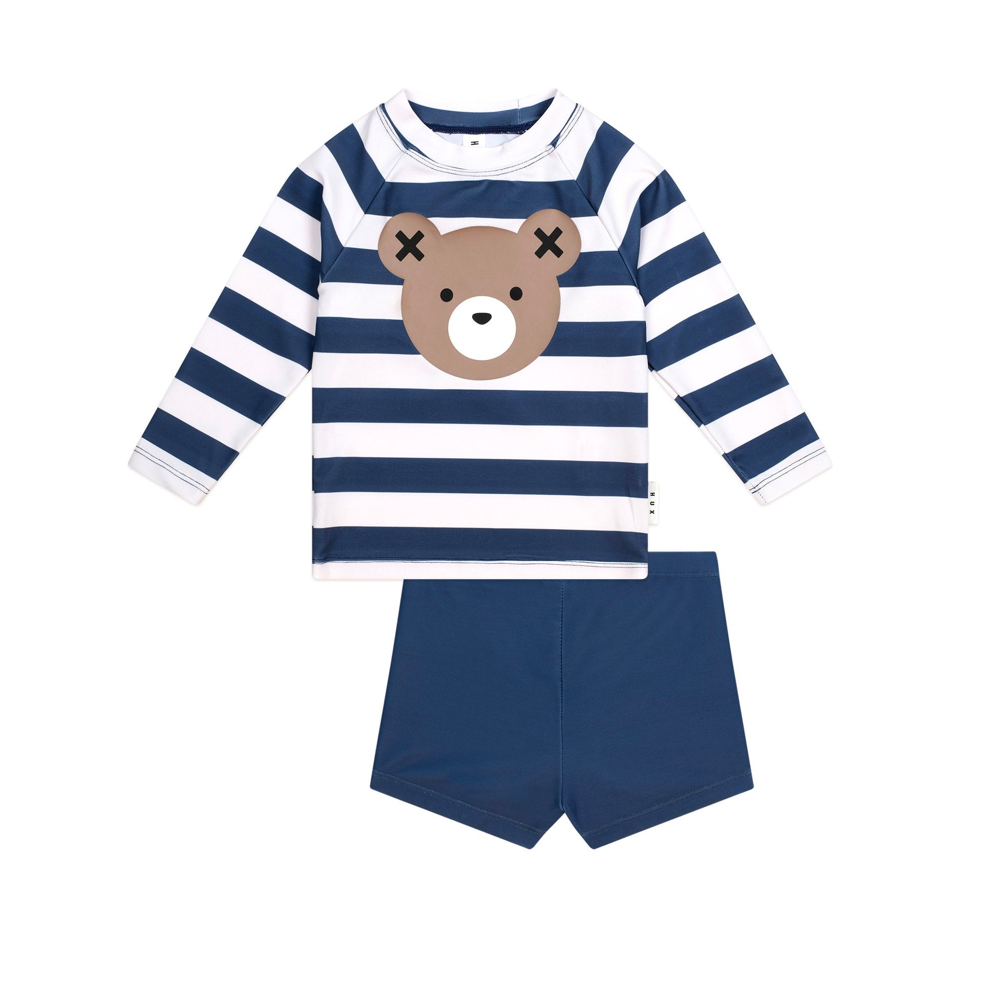 Children's outfit with striped shirt and bear face design, paired with navy shorts on a white background.