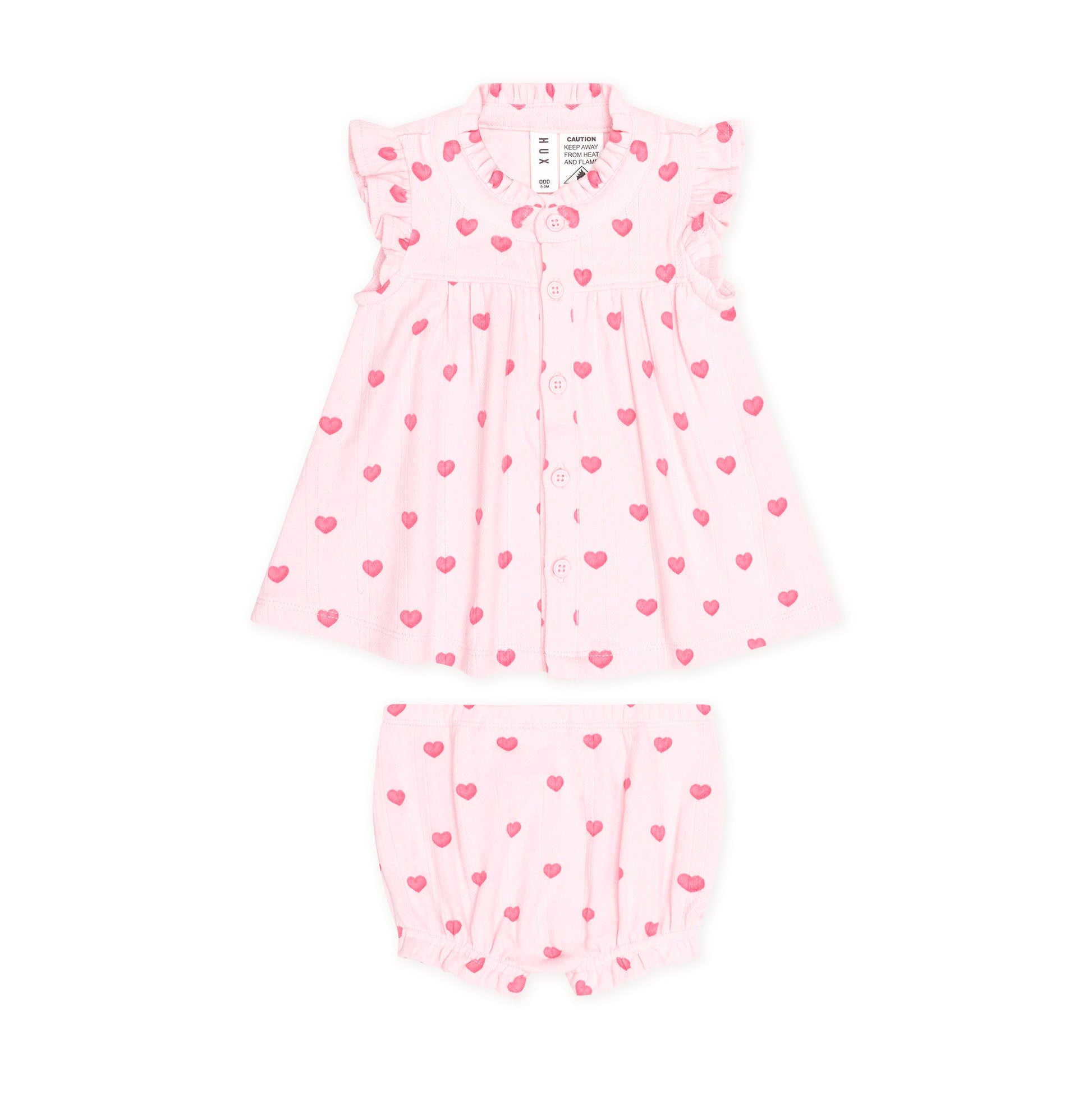 A two-piece baby outfit set consisting of a light pink dress with ruffle sleeves and a matching pair of bubble shorts, both decorated with a small pink heart pattern, shown on a plain white background.