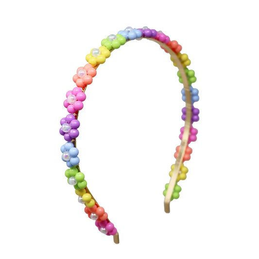 Colorful beaded headband on a white background