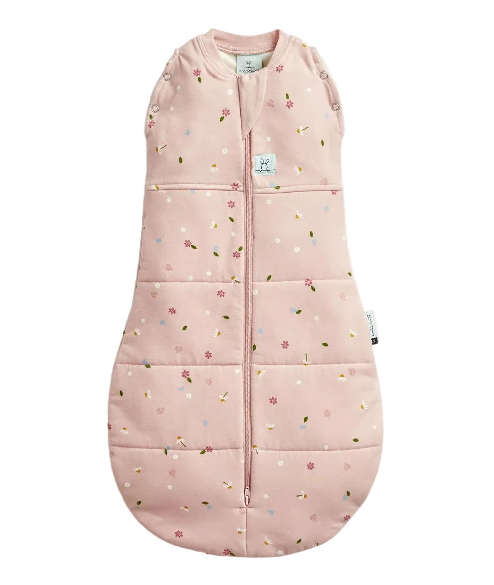 Pink baby sleeping bag with floral pattern on a white background