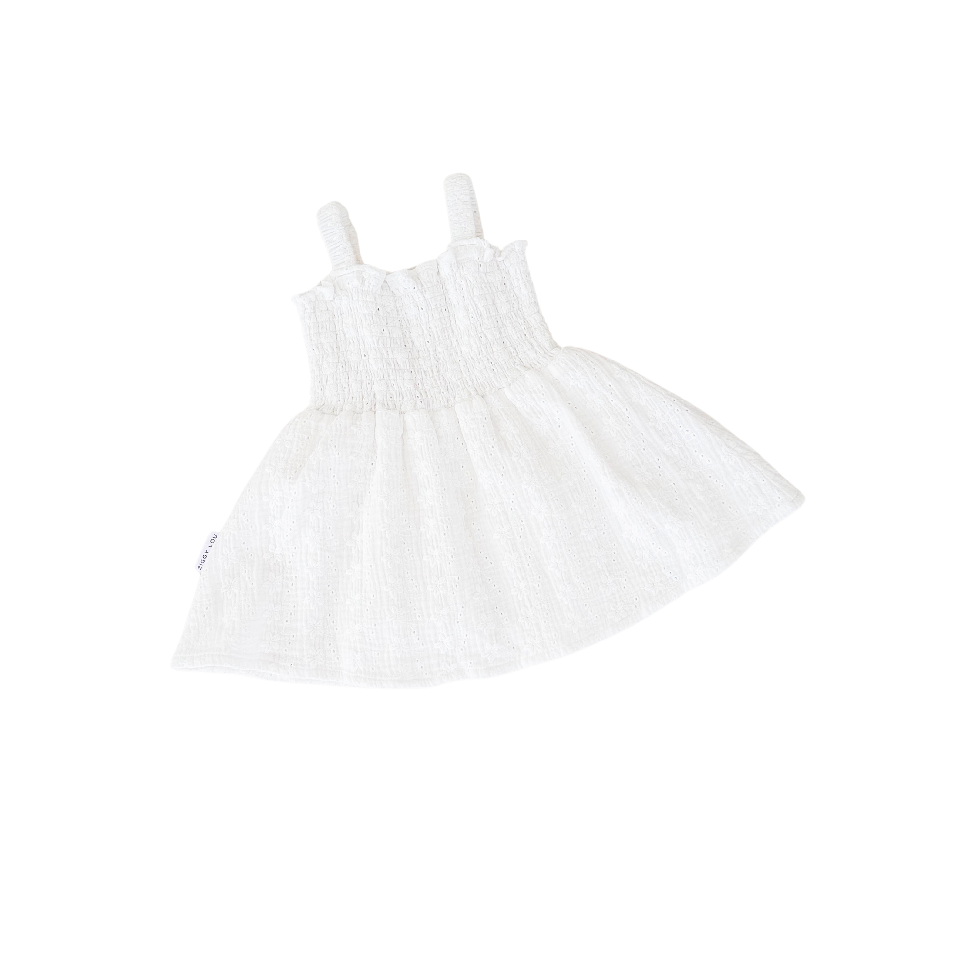 White dress with thin straps on a white background