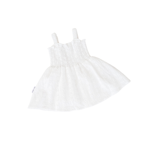 White dress with thin straps on a white background