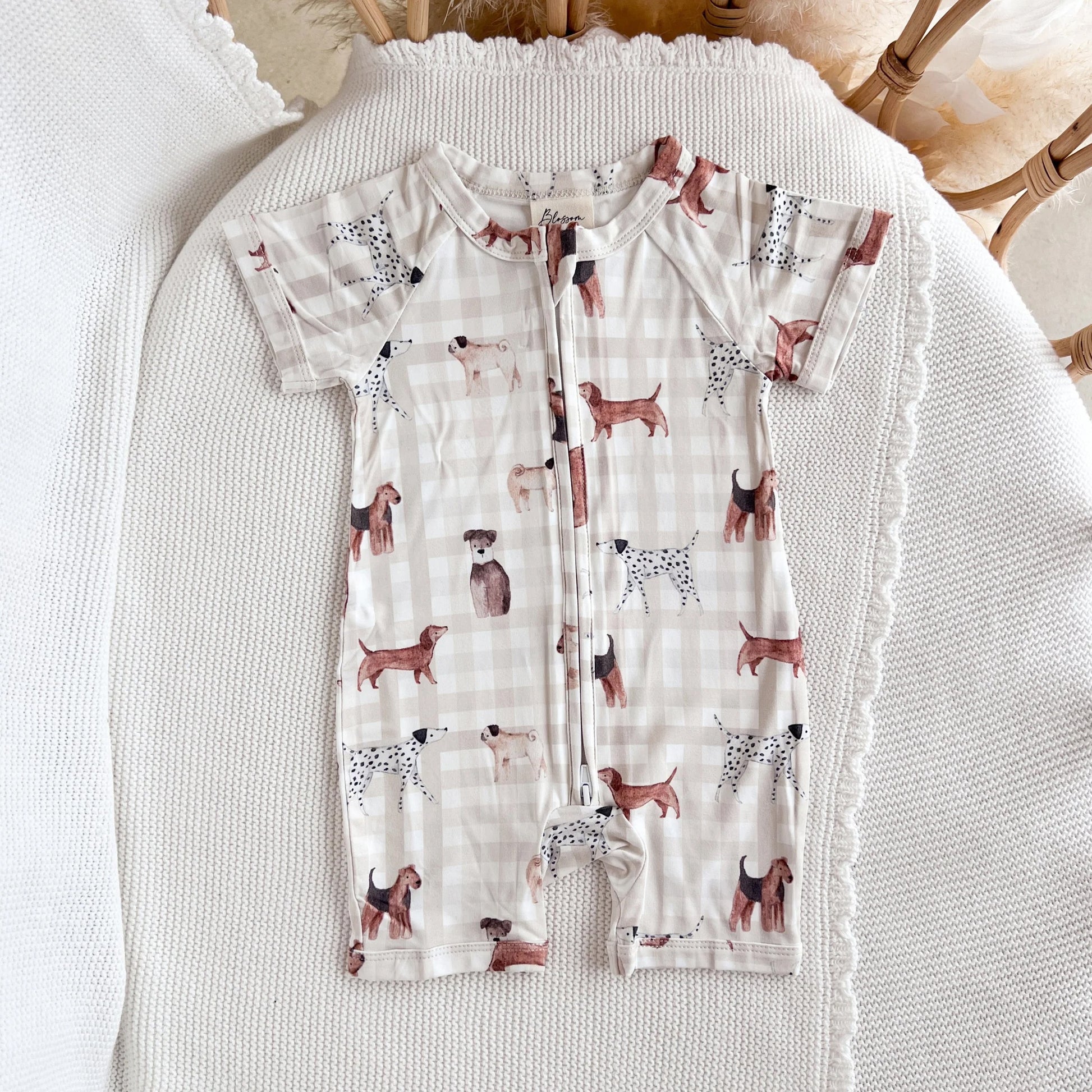 Children's outfit with dog pattern on a textured surface