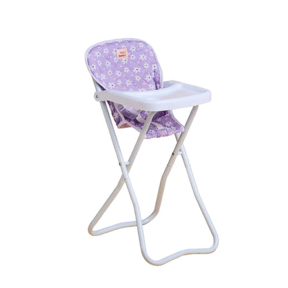 Children's high chair with a purple floral seat on a beige background