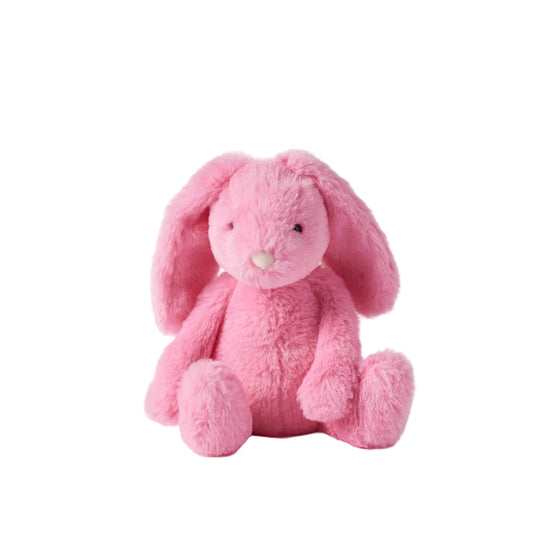 Pink plush bunny toy on a light gray background
