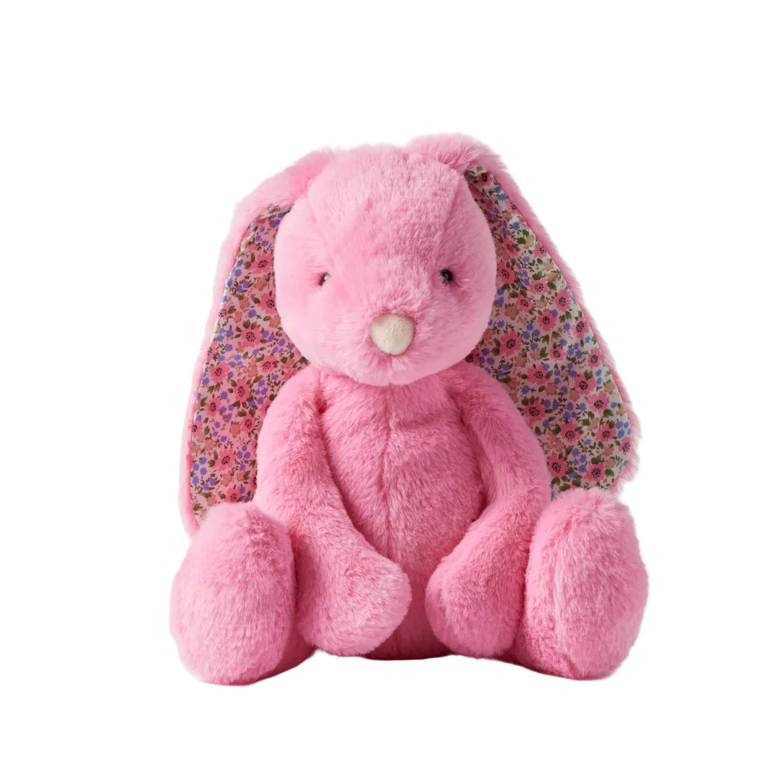 Pink plush bunny with floral ears on a white background