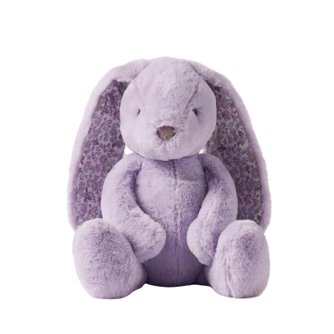 Purple plush bunny with floral ears on a white background
