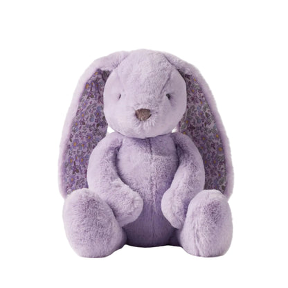 Purple plush bunny with floral ears on a white background