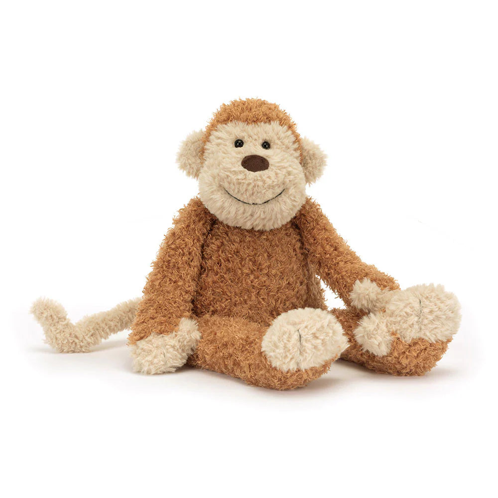 Stuffed monkey toy on a white background