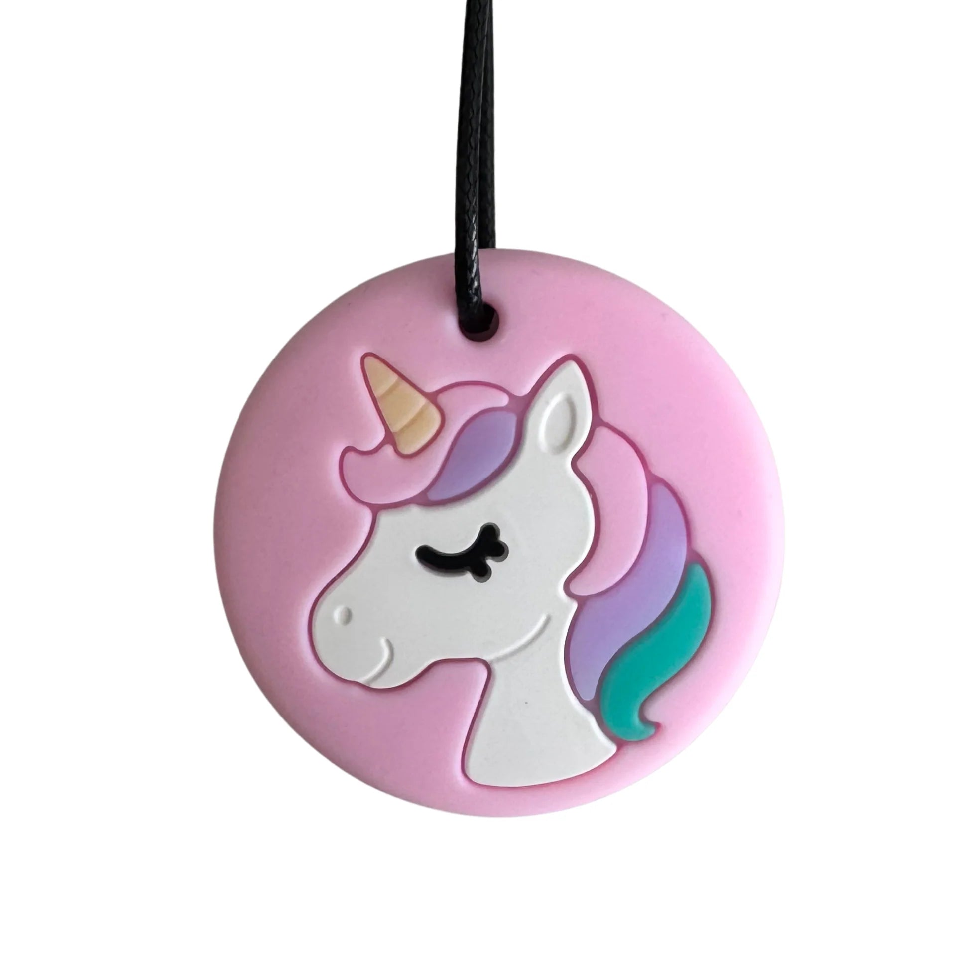 Pink unicorn pendant with a black cord on a white background