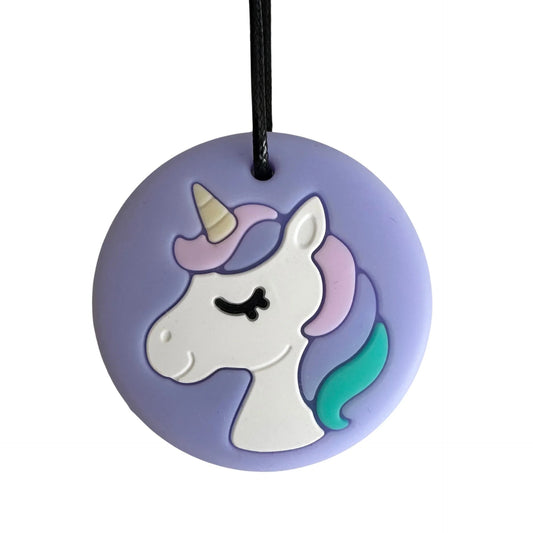 Unicorn-shaped pendant on a purple background