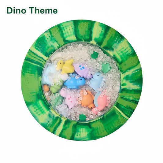 Dinosaur-themed toy set with colorful dinosaurs in a green and white container.