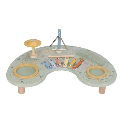 Children's musical toy set with various instruments on a white background