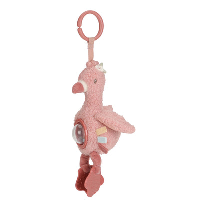 Pink plush flamingo toy with a clip on a white background