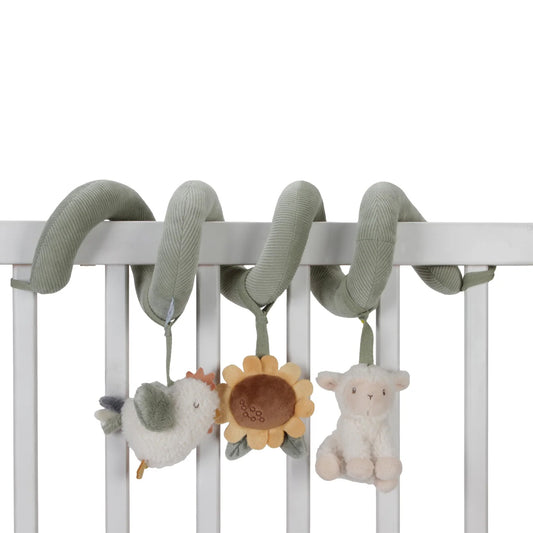 Crib mobile with hanging toys including a bird, sunflower, and sheep on a white background